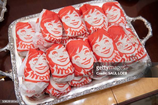 This photo shows food from Wendy's, some of the fast food the US president purchased for a ceremony honoring the 2018 College Football Playoff...