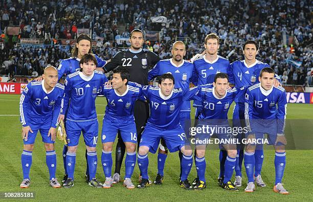 Argentina's national football team players defender Martin Demichelis, goalkeeper Sergio Romero, midfielders Juan Sebastian Veron and Mario Bolatti...