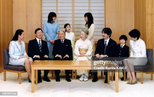 In this photo released by the Imperial Household Agency, Japan's Emperor Akihito, center left, and Empress Michiko, center right, smile to Prince...