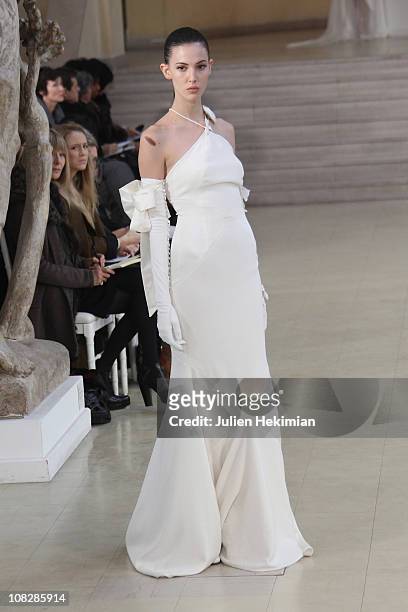 Model walks the runway during the Alexis Mabille show as part of the Paris Haute Couture Fashion Week Spring/Summer 2011 at Musee Bourdelle on...