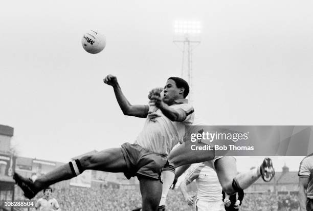 John Barnes of Watford heads the ball outjumping Kirk Stephens of Luton Town during the Watford v Luton Town Division 2 match played at Vicarage...