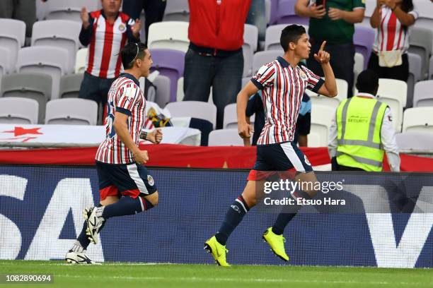 Angel Zaldivar of Guadalajara celebrates scoring his side's first goal during the match between Kashima Antlers and CD Guadalajara on December 15,...