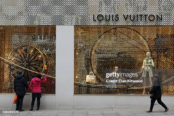 A dress is displayed in the Louis Vuitton store window on Bond Street  News Photo - Getty Images