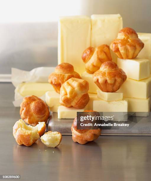 piles of brioche on piles of butter - brioche stock pictures, royalty-free photos & images