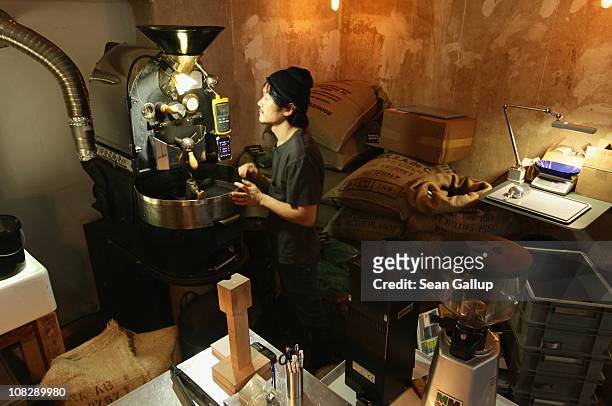 Kiduk Reus oversees espresso coffee beans roasting in his refurbished 1918 Probat coffee bean roaster at Bonanza Coffee Roasters on January 24, 2011...