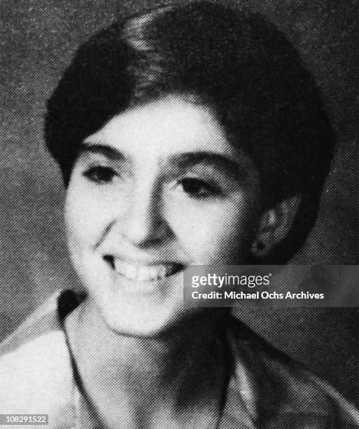 Madonna poses for her senior year book photo at Adams High School in 1976 in Rochester, Michigan.