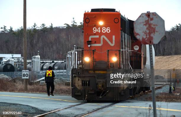 cn rail locomotive - level crossing stock pictures, royalty-free photos & images