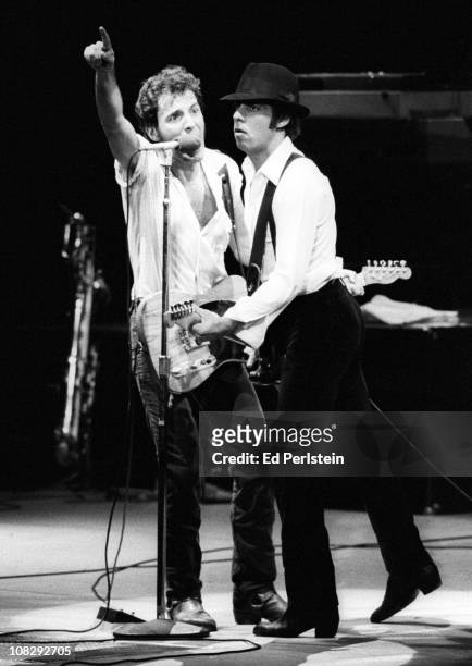 Bruce Springsteen and Little Steven perform at the Oakland Coliseum in October 1981 in Oakland, California.