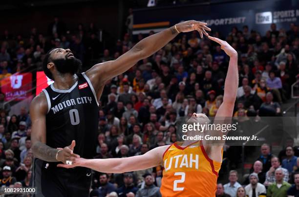 Andre Drummond of the Detroit Pistons and Joe Ingles of the Utah Jazz look for rebound in the second half of a NBA game at Vivint Smart Home Arena on...