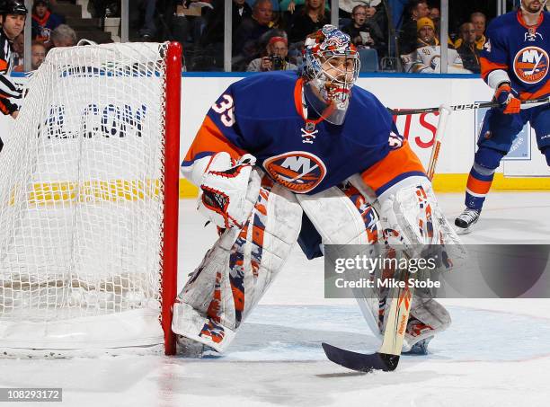 Goaltender Rick DiPietro of the New York Islanders skates against the Buffalo Sabres on January 15, 2011 at Nassau Coliseum in Uniondale, New York....