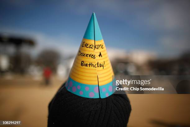 Demonstrator wears a message on her party hat during an anti-abortion rally ahead of the March for Life on the National Mall January 24, 2011 in...