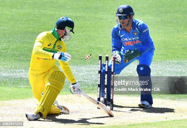 Dhoni of India stumps Peter Handscomb of Australia during game two of the One Day International series between Australia and India at Adelaide Oval...