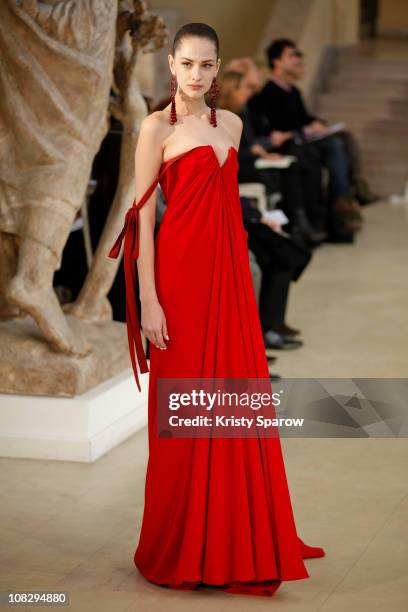 Model walks the runway during the Alexis Mabille show as part of the Paris Haute Couture Fashion Week Fall/Winter 2011 at Musee Bourdelle on January...