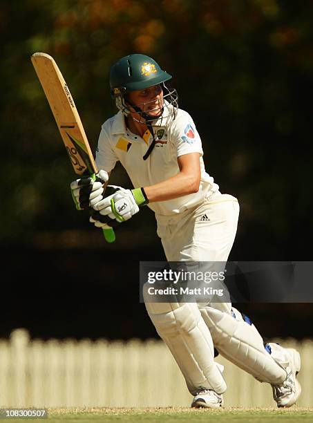 Sarah Elliott of Australia plays a leg side shot during day four of the Women's CBA Test match between Australia and England at Bankstown Oval on...