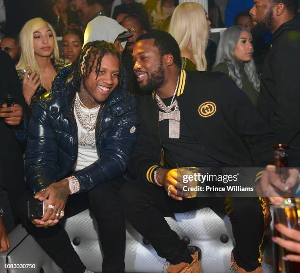 Rapper Lil Durk and Meek Mill attend Meek Mill "Championships" album release party at Mansion Elan on December 15, 2018 in Atlanta, Georgia.