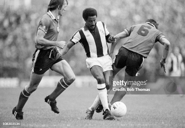 Brendon Batson of West Bromwich Albion moves between Southampton defenders Dave Watson and Chris Nicholl during their Division One match held at The...