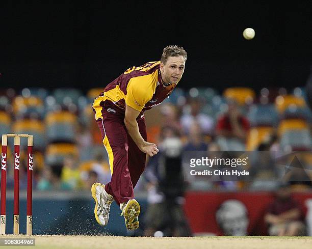 Nathan Rimmington of the Bulls bowls during the Twenty20 Big Bash match between the Queensland Bulls and the Western Australia Warriors at The Gabba...