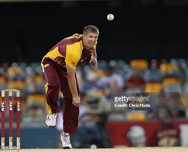 James Hopes of the Bulls bowls during the Twenty20 Big Bash match between the Queensland Bulls and the Western Australia Warriors at The Gabba on...