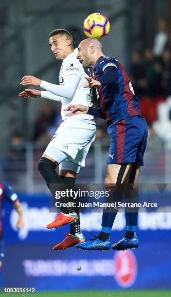 Rodrigo Moreno of Valencia CF duels for the ball withIvan Ramis of SD Eibar during the La Liga match between SD Eibar and Valencia CF at Ipurua...