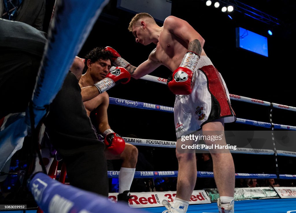 Boxing Garner Ryan Garner consoles Jose Aguilar after his victory at Brentwood ...