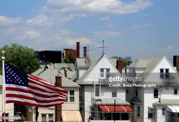 suburban wooden row houses and american flag in brooklyn, new york city - brooklyn new york houses aerial stock pictures, royalty-free photos & images
