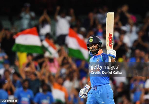 Virat Kohli of India celebrates after reaching his century during game two of the One Day International series between Australia and India at...