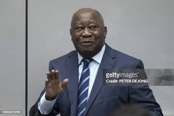 Former Ivory Coast President Laurent Gbagbo enters the courtroom of the International Criminal Court in The Hague on January 15 where judges were...