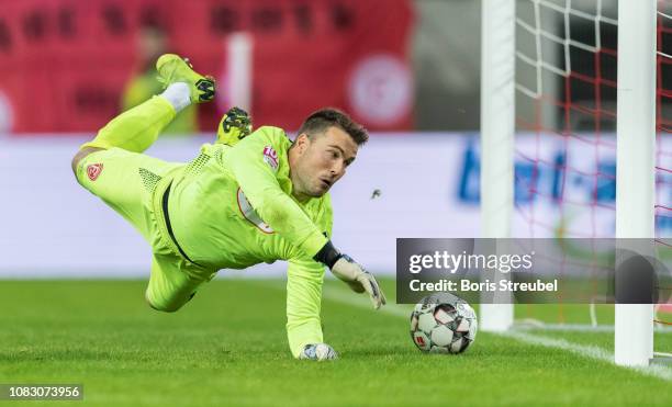 Goalkeeper Michael Rensing of Fortuna Duesseldorf saves a ball during the penalty shoot-out during the Telekom Cup 2019 semi-final match between...