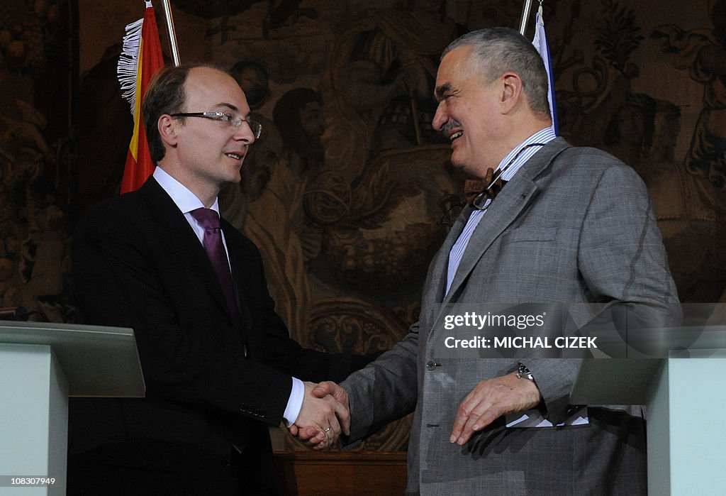 Macedonian Foreign Minister Antonio Milososki shakes hands with Czech
