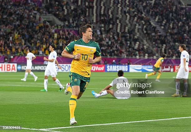 Harry Kewell of Australia celebrates his goal during the AFC Asian Cup Semi Final match between Uzbekistan and the Australian Socceroos at Khalifa...