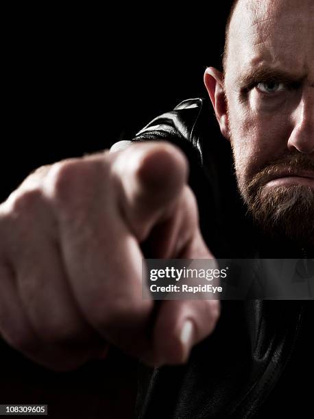 angry man pointing an accusing finger - desire stock pictures, royalty-free photos & images