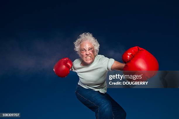 boxing grandmother - slaan met vuist stockfoto's en -beelden