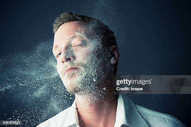 man getting splashed in flour - boom for real stock pictures, royalty-free photos & images