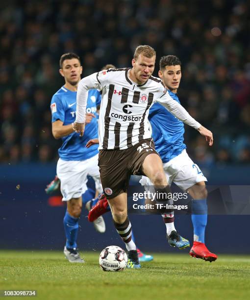 Anthony Losilla of VfL Bochum 1848, Henk Veerman of FC St. Pauli, Görkem Saglam of VfL Bochum 1848 battle for the ball during the Second Bundesliga...