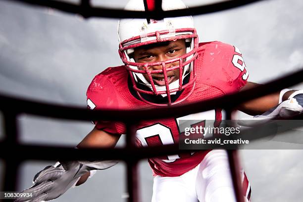 football: linebacker attack - football player face stock pictures, royalty-free photos & images