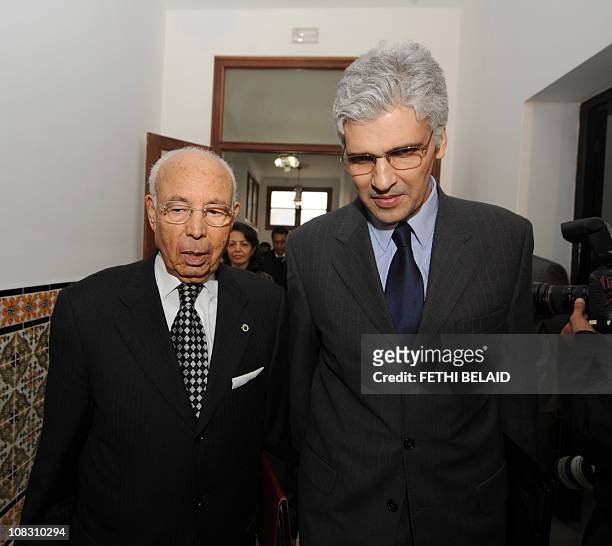 Tunisian International Cooperation Mohamed Nouri Jouini and Justice minister Lazhar Karoui Chebbi arrive to attend the first ministers cabinet on...