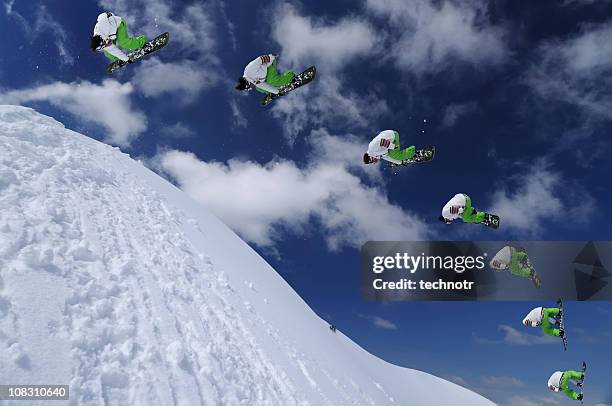 multiple image of snowboarder in mid air - continuity stockfoto's en -beelden