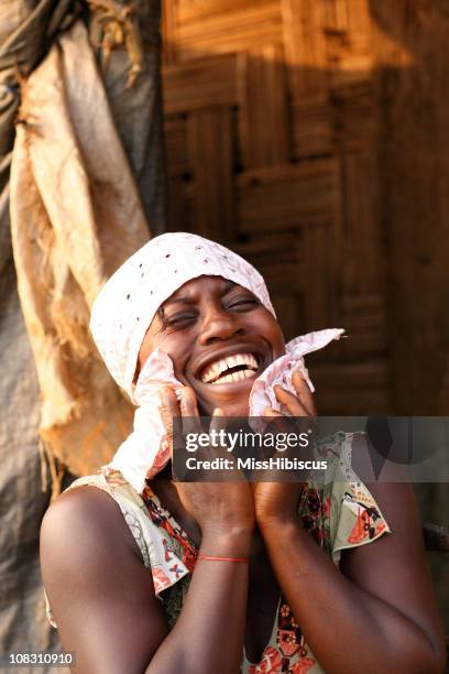 african woman laughing - liberian culture stock pictures, royalty-free photos & images