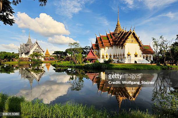 ancient kings palace with reflection in a lake - ayuthaya stock pictures, royalty-free photos & images