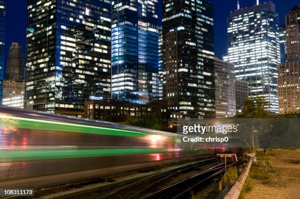 commuter train in the chicago loop - metra train stock pictures, royalty-free photos & images