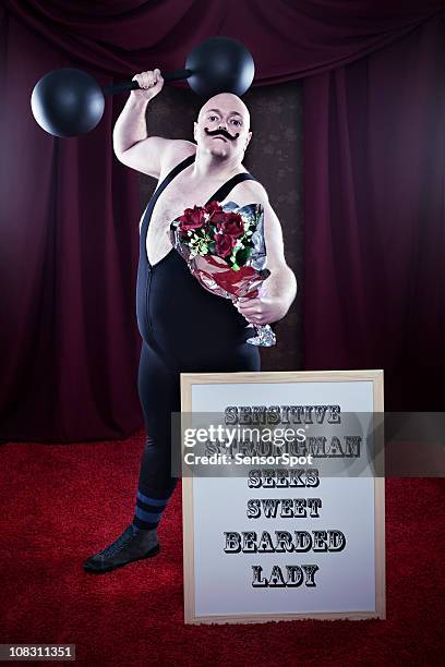 sensitive strongman - circus poster stock pictures, royalty-free photos & images