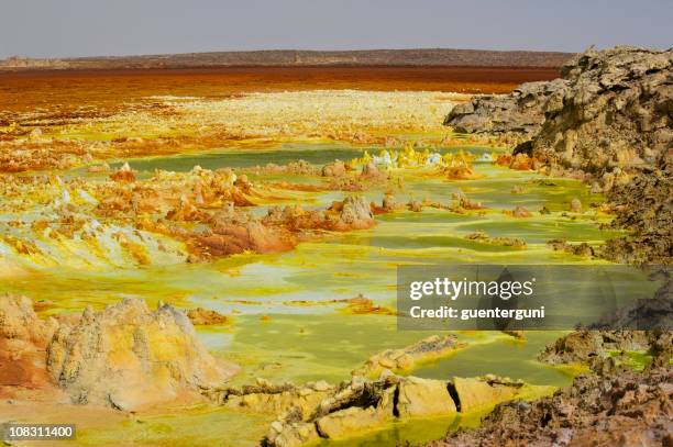 inside the explosion crater of dallol volcano, danakil depression, ethiopia - scientist and explosion stock pictures, royalty-free photos & images