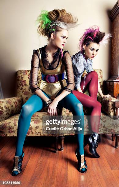 punk girls in a retro living room - retro swimwear stock pictures, royalty-free photos & images