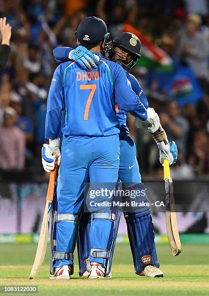 Dinesh Rai Dinesh Karthik of India hugs MS Dhoni of India at the end of the game ...