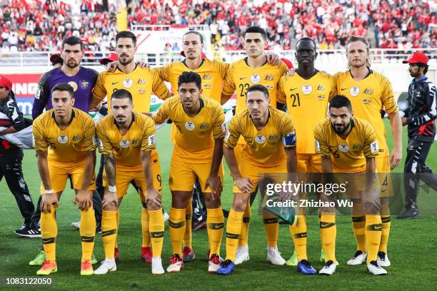 Players of Australia line up for team photos prior to the AFC Asian Cup Group B match between Australia and Syria at Khalifa Bin Zayed Stadium on...