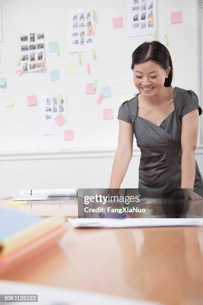 chinese businesswoman working in office - storyboard stock pictures, royalty-free photos & images