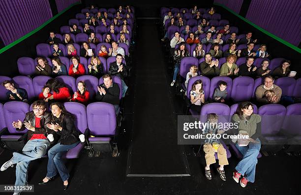 movie theater audience - packed theater stock pictures, royalty-free photos & images