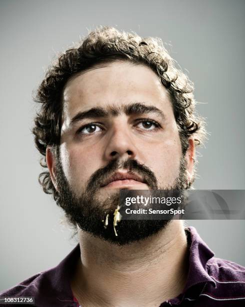 young man after lunch - fat man beard stock pictures, royalty-free photos & images