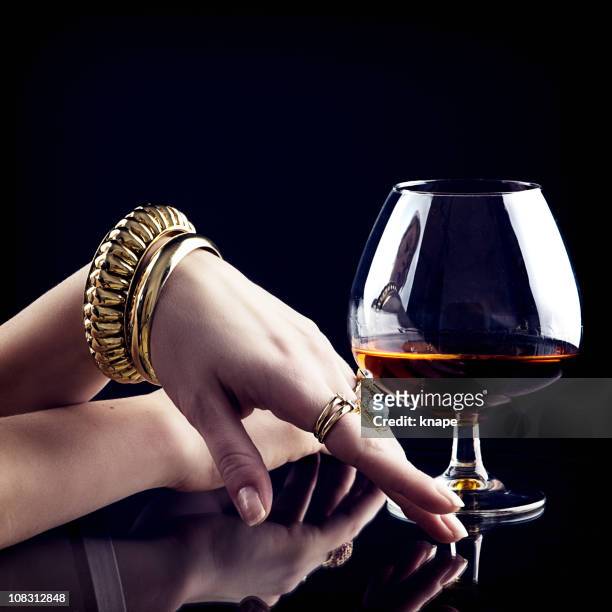 cognac and jewelry - cognac stockfoto's en -beelden
