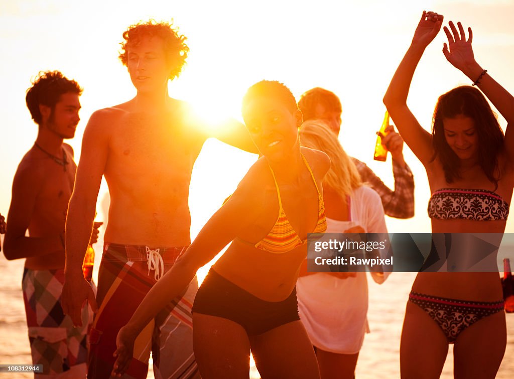 Young People Enjoying a Summer Beach Party.